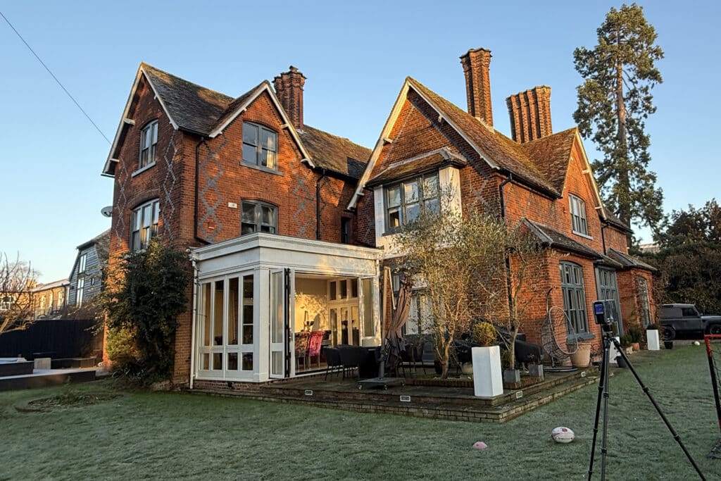 Photo of the existing listed vicarage during the 3D laser scanning process.