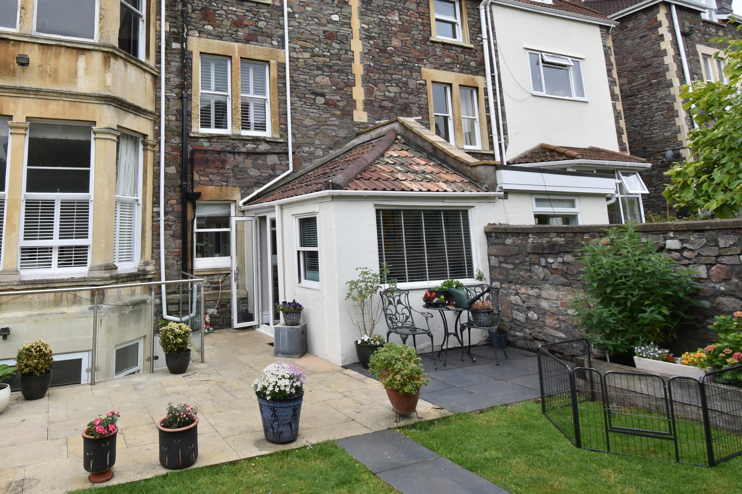 External view of the outdated kitchen extension in Bristol prior to demolition and replacement with a modern glass extension.