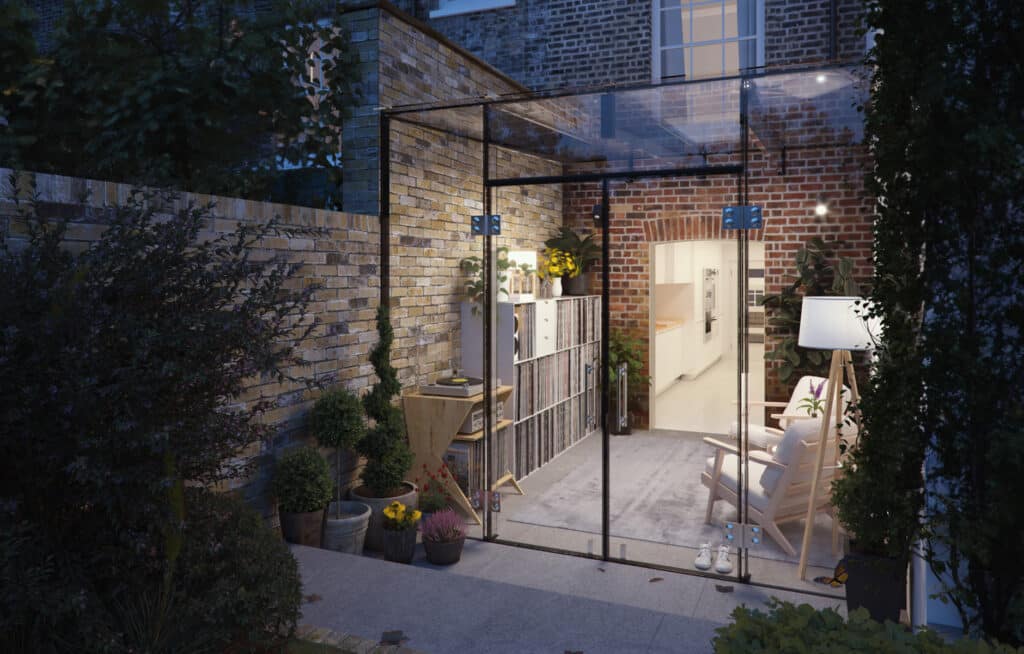 External view of a modern frameless glass cube extension with low-iron roof glazing and full-height French doors 1