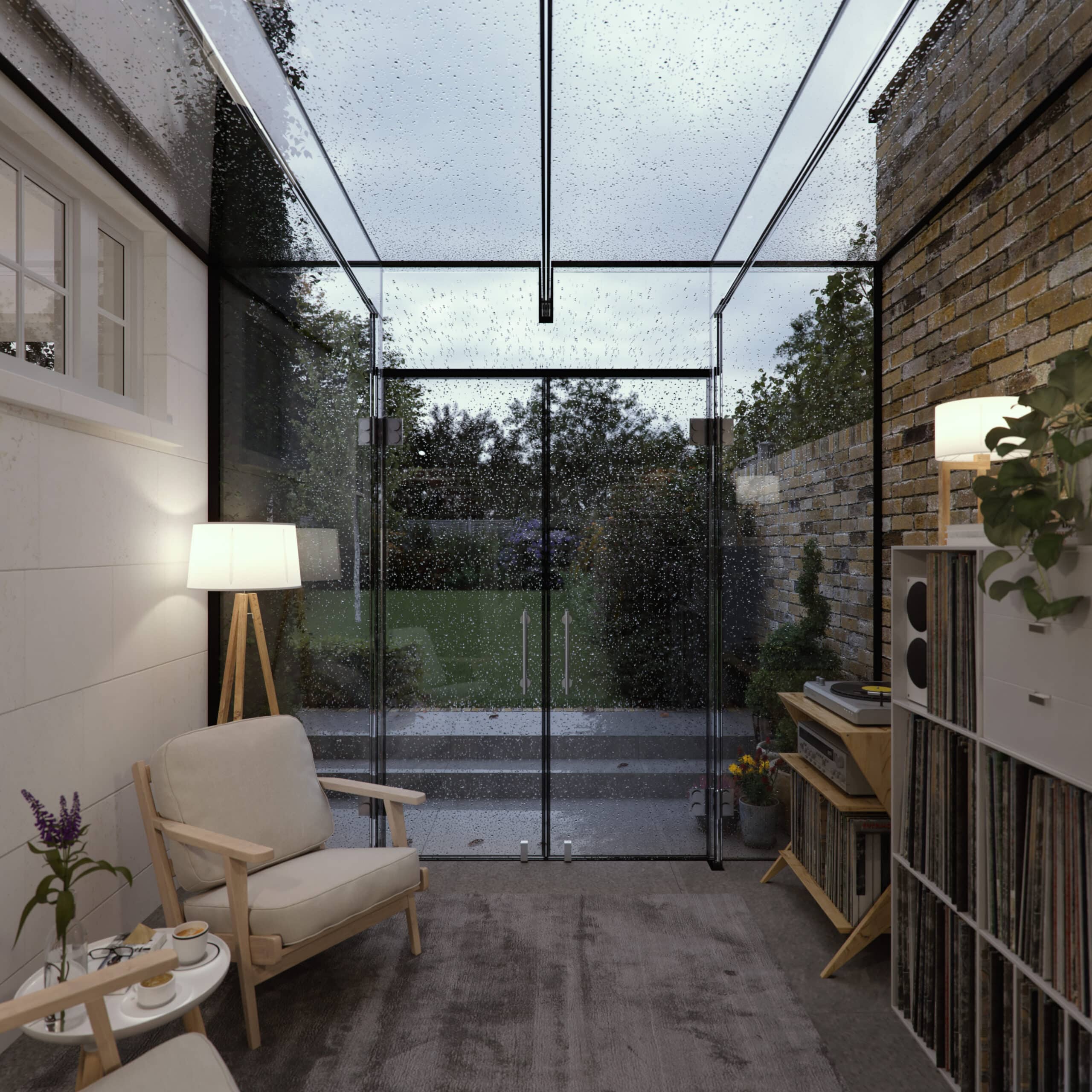 Internal view of a modern frameless glass cube extension with low-iron roof glazing and full-height French doors.