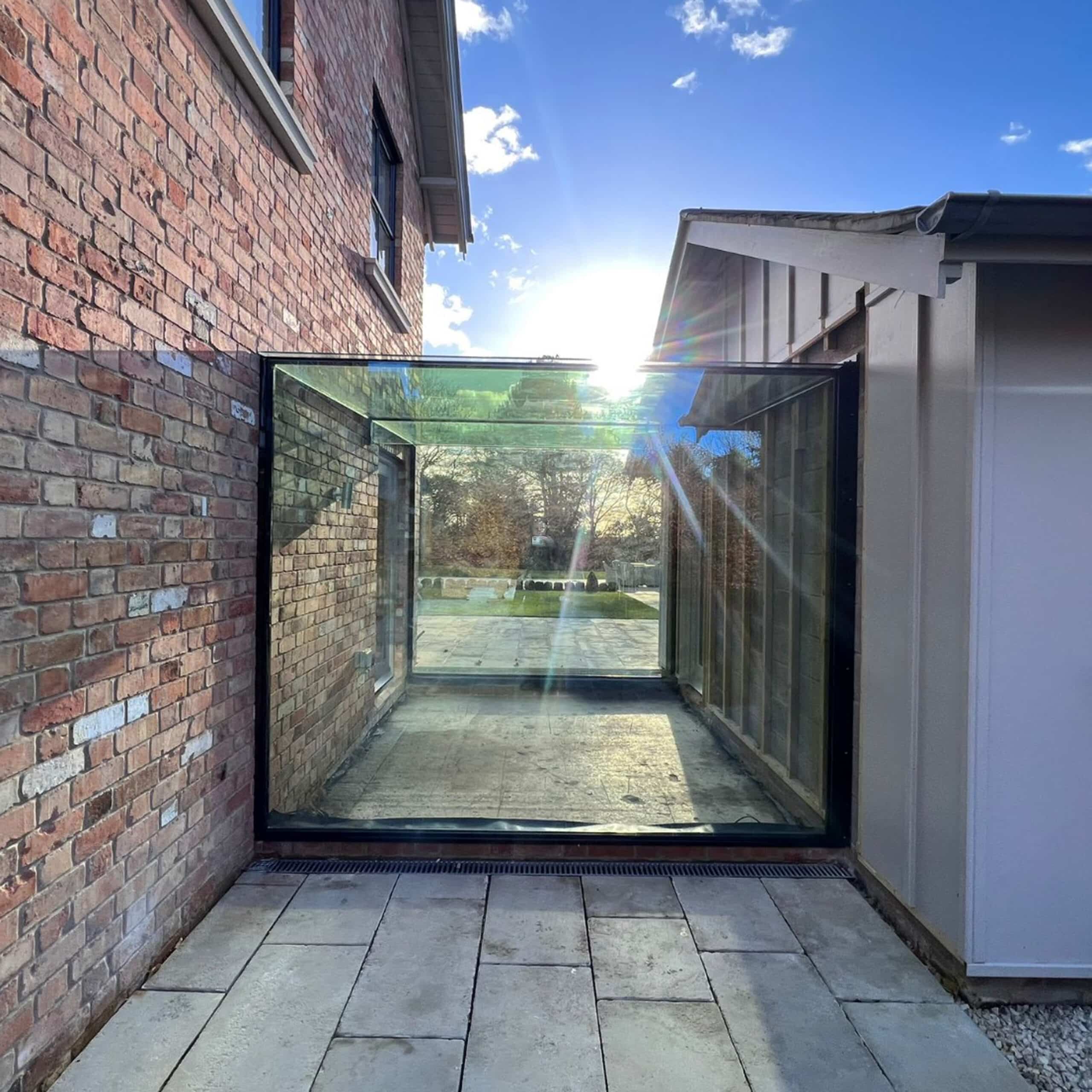 External view of the completed solar-controlled glass link connecting the main house and annexe in Nottingham.