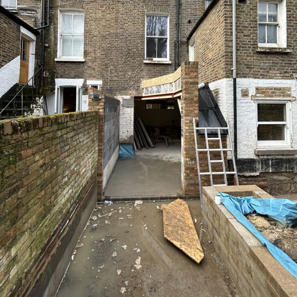 Site prepared for digital 3D laser scan before installation of a bespoke London glass extension.