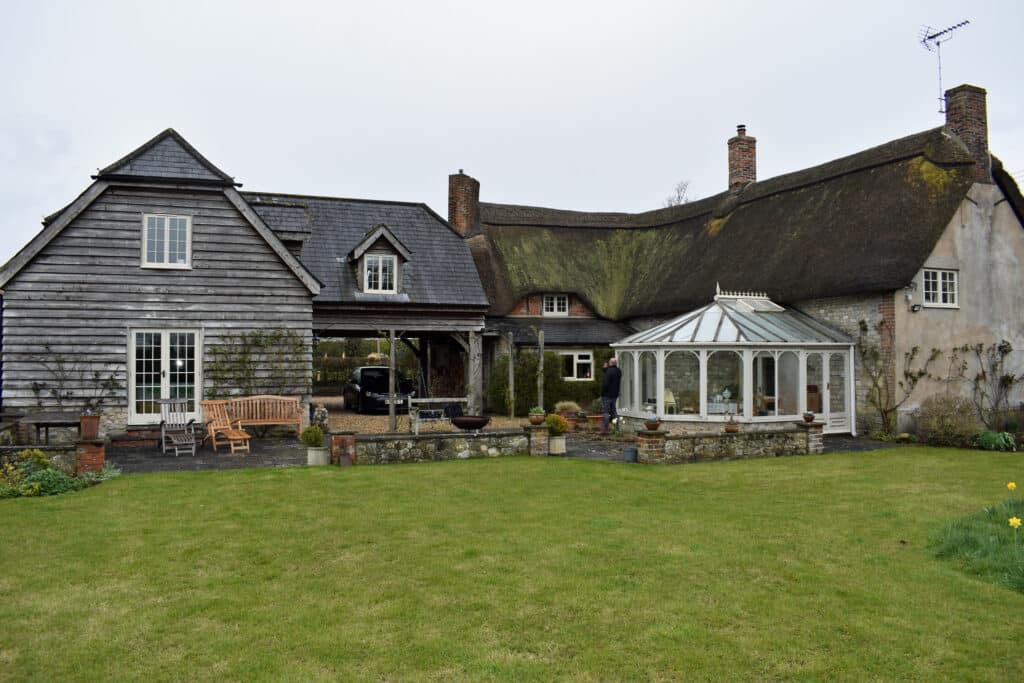 Photo of existing extension before demolition at thatched cottage in Warminster.